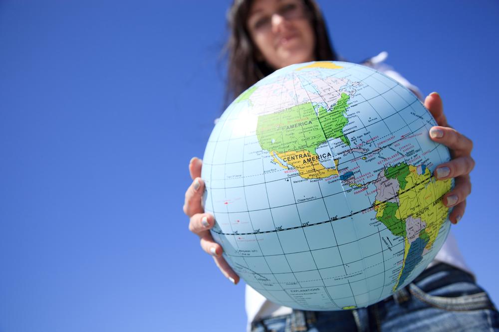 Women Holding World